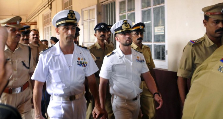 LaPresse25-05-2012CronacaMassimiliano Latorre e Salvatore Girone lasciano il carcere di TrivamdrumItalian marine Massimiliano Latorre, left, and fellow marine Salvatore Girone are produced at a court in Kollam, India, Friday, May 25, 2012. The two marines are accused of fatally shooting two Indian fishermen from the Italian cargo vessel Enrica Lexie off southwest India. The marines were part of the cargo ship's security team, and India accuses them of mistaking the fishing boat for a pirate ship.