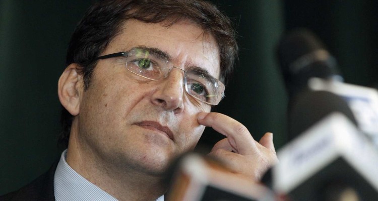 Nicola Cosentino gestures during a media conference in Naples January 22, 2013. Former Italian Prime Minister Silvio Berlusconi has dropped former allies accused of corruption and mafia association as election candidates, in a bid to shed the image of scandal that has dogged sections of his centre-right party. Late on Monday, Berlusconi's party secretary Angelino Alfano said Cosentino, a former junior economy minister whose power base is in the heartland of the Camorra or Naples mafia, would not return to parliament after the election.  REUTERS/Ciro De Luca ( ITALY - Tags: POLITICS CRIME LAW ELECTIONS)