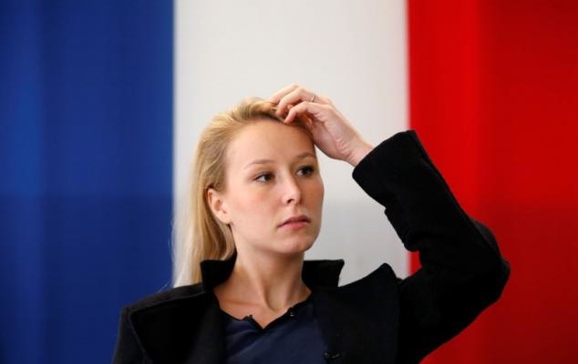 Marion Marechal-Le Pen, French National Front political party member and current deputy in Parliament, attends during an interview with Reuters as she campaigns for the upcoming regional election for the Provence-Alpes-Cote d'Azur (PACA) region in Carpentras, France, November 10, 2015. REUTERS/Jean-Paul Pelissier