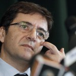 Nicola Cosentino gestures during a media conference in Naples January 22, 2013. Former Italian Prime Minister Silvio Berlusconi has dropped former allies accused of corruption and mafia association as election candidates, in a bid to shed the image of scandal that has dogged sections of his centre-right party. Late on Monday, Berlusconi's party secretary Angelino Alfano said Cosentino, a former junior economy minister whose power base is in the heartland of the Camorra or Naples mafia, would not return to parliament after the election.  REUTERS/Ciro De Luca ( ITALY - Tags: POLITICS CRIME LAW ELECTIONS)