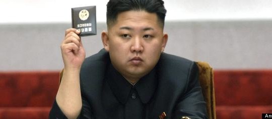 epa03309465 A fiile picture released by the North Korean Central News Agency (KCNA) on 14 April 2012 shows North Korean leader Kim Jong-un holding up a card at the Fifth Session of the 12th Supreme People's Assembly at the Mansudae Assembly Hall in Pyongyang, North Korea, on 13 April 2012. Kim Jong-un was named Marshal of the North Korean army, North Korean media announced on 18 July 2012.  EPA/KCNA SOUTH KOREA OUT