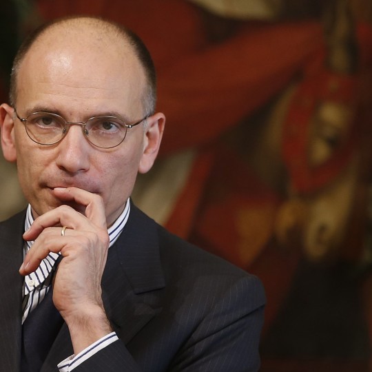 Italy's Prime Minister Enrico Letta listens to a reporter's questions during a joint news conference with Angel Gurria, secretary-general of the Organisation for Economic Co-operation and Development (OECD) at Chigi Palace in Rome May 2, 2013. REUTERS/Tony Gentile (ITALY - Tags: POLITICS BUSINESS)