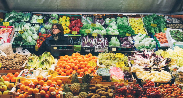 Woman working in the night Market of Padova in Italy