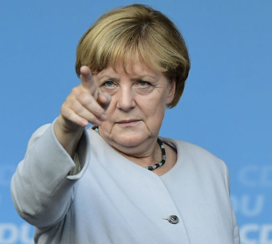 German Chancellor Angela Merkel points during an electoral meeting of the Christian Democtaric Union (CDU) party ahead of the weekend's state elections in Berlin of September 14, 2016. / AFP / TOBIAS SCHWARZ        (Photo credit should read TOBIAS SCHWARZ/AFP/Getty Images)