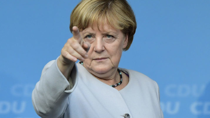 German Chancellor Angela Merkel points during an electoral meeting of the Christian Democtaric Union (CDU) party ahead of the weekend's state elections in Berlin of September 14, 2016. / AFP / TOBIAS SCHWARZ        (Photo credit should read TOBIAS SCHWARZ/AFP/Getty Images)