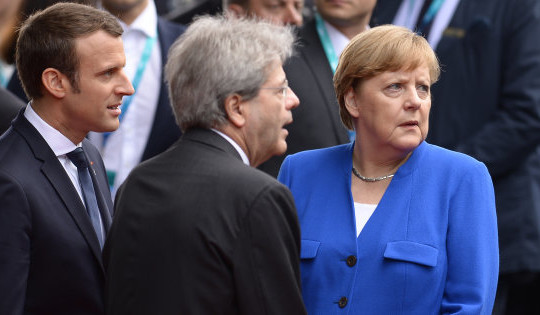 French President Emmanuel Macron (L), Italian Prime Minister Paolo Gentiloni and German Chancellor Angela Merkel arrive at the Hotel San Domenico during the Summit of the Heads of State and of Government of the G7, the group of most industrialized economies, plus the European Union, on May 26, 2017 in Sicily.
The leaders of Britain, Canada, France, Germany, Japan, the US and Italy will be joined by representatives of the European Union and the International Monetary Fund (IMF) as well as teams from Ethiopia, Kenya, Niger, Nigeria and Tunisia during the summit from May 26 to 27, 2017. / AFP PHOTO / Filippo MONTEFORTE        (Photo credit should read FILIPPO MONTEFORTE/AFP/Getty Images)