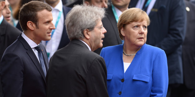 French President Emmanuel Macron (L), Italian Prime Minister Paolo Gentiloni and German Chancellor Angela Merkel arrive at the Hotel San Domenico during the Summit of the Heads of State and of Government of the G7, the group of most industrialized economies, plus the European Union, on May 26, 2017 in Sicily.
The leaders of Britain, Canada, France, Germany, Japan, the US and Italy will be joined by representatives of the European Union and the International Monetary Fund (IMF) as well as teams from Ethiopia, Kenya, Niger, Nigeria and Tunisia during the summit from May 26 to 27, 2017. / AFP PHOTO / Filippo MONTEFORTE        (Photo credit should read FILIPPO MONTEFORTE/AFP/Getty Images)